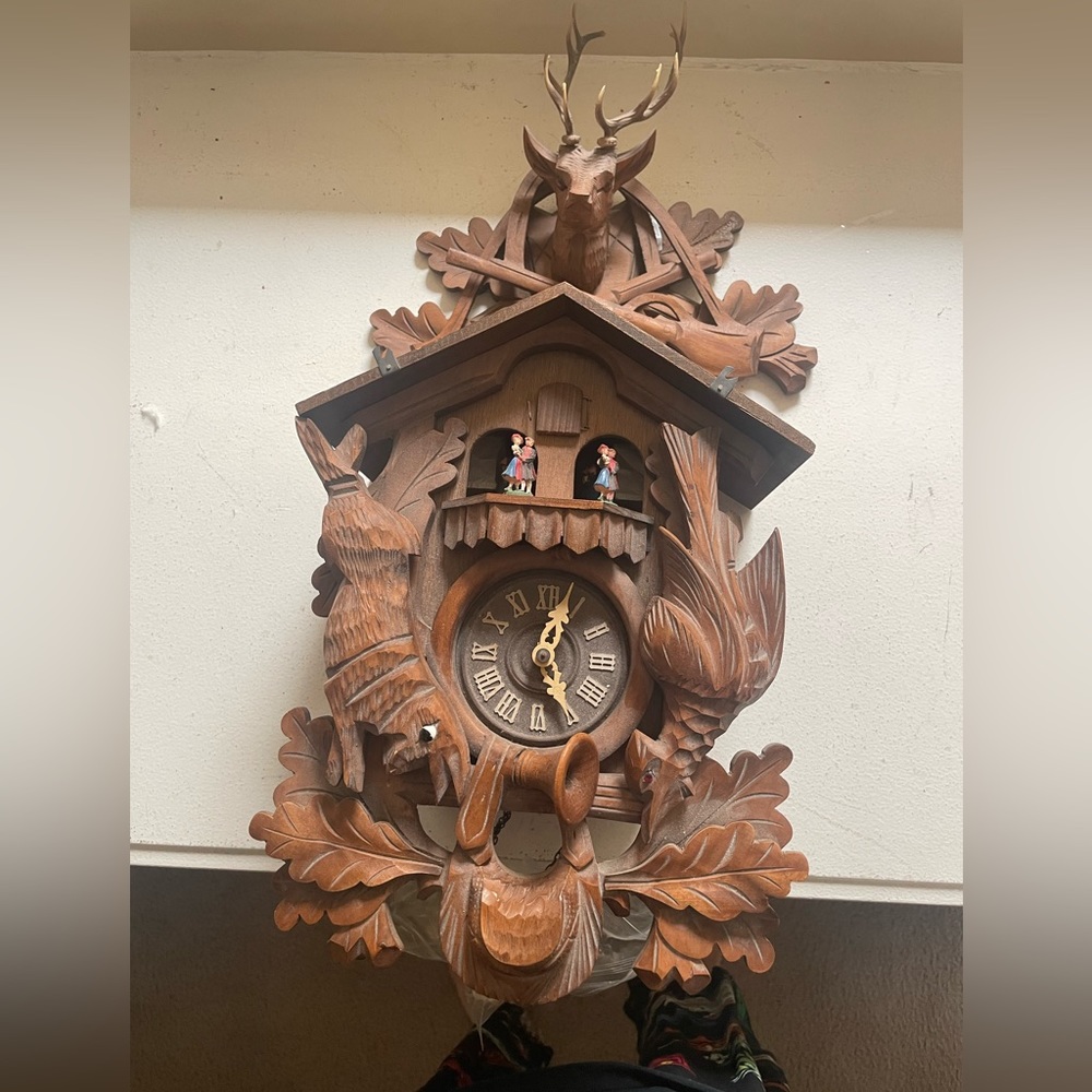 Coo Coo Clock Handmade in Germany 

Black Forest original 
dancing children